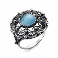 Ажурное серебряное кольцо с голубой вставкой